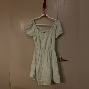 Mint dress. Open back that needs to be tied.
